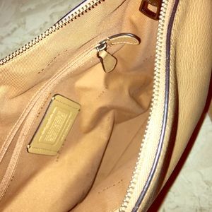 Crossed over coach brown leather bag